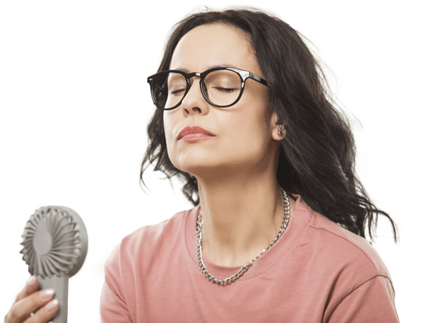 Duelle Hormone Replacement Therapy footer image of a beautiful woman in her early 50's wearing a dusty ping top holding a tube holding a hand held fan which is blowing on her face.